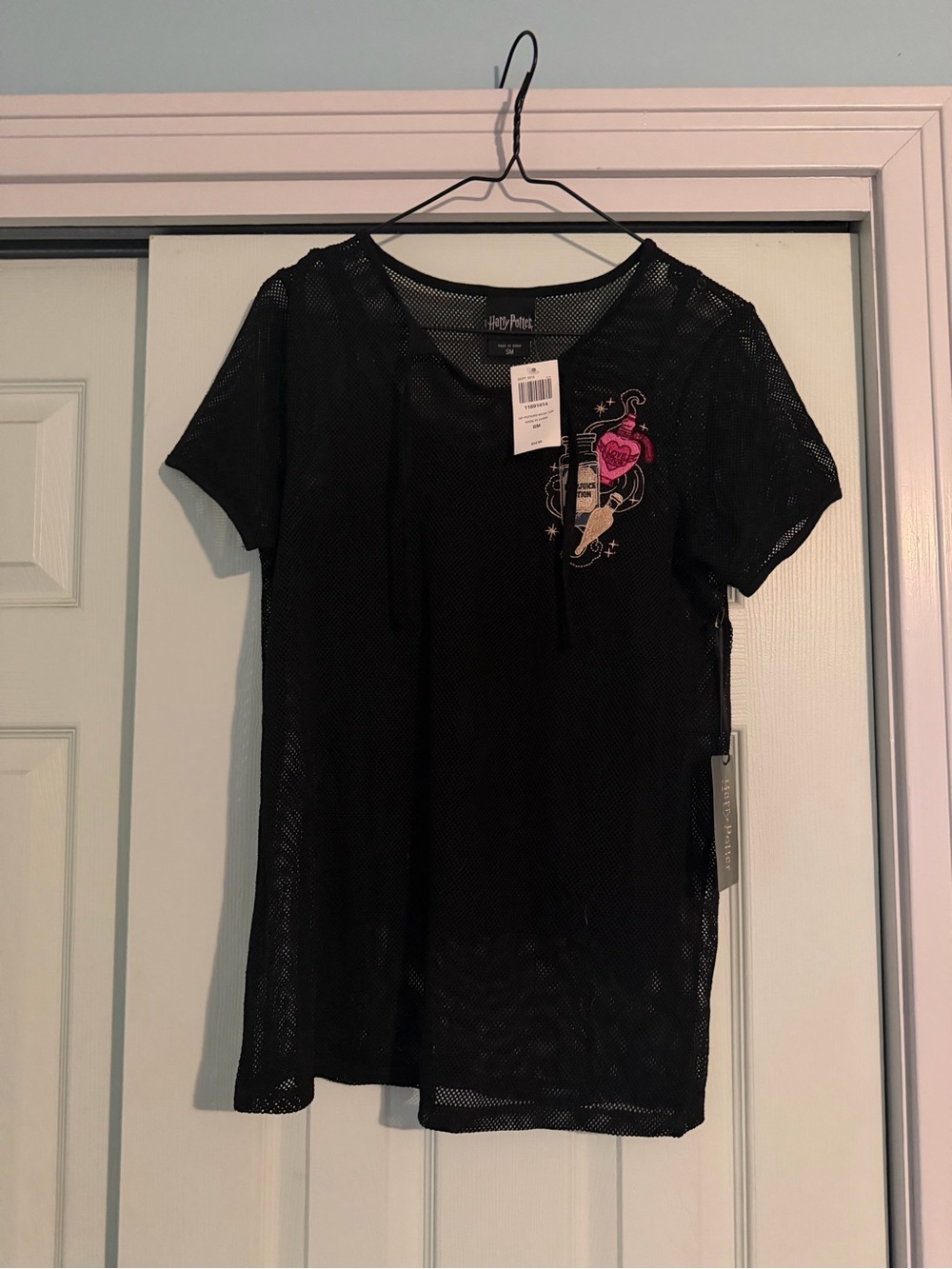 Harry Potter Women's Black Mesh Graphic Tee with Pink Accent